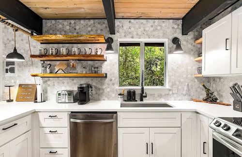 Burley Cabin | Family friendly cabin nestled in the trees and walking distance to beach.
