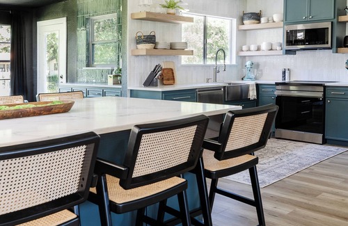 Leisure Land House | Family-Friendly Lake Retreat: Kayaks, Fire Pit, Views, and Award Winning Design