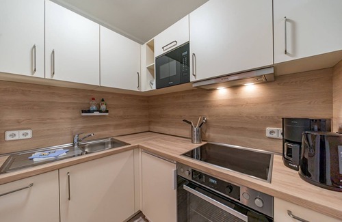 Schillig Apartment | Family-friendly maisonette on the North Sea with balcony and beach access