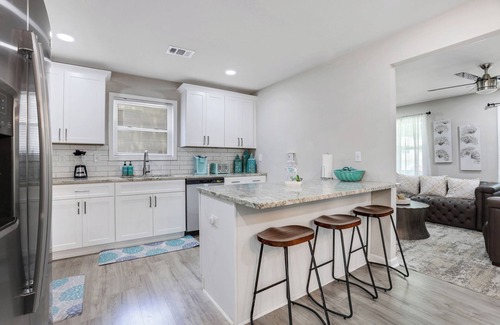Church Street House | Family-Friendly near Airport, Screened Deck, Backyard Oasis, Workspace & Parking
