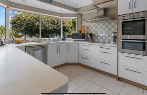 Papamoa Beach House | Family Friendly Retreat: Heated Pool, Spa, 5min walk to beach