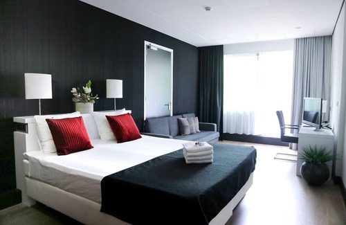 Uden Hotel | Family-Friendly Room Steps from De Maashorst Park & Trails