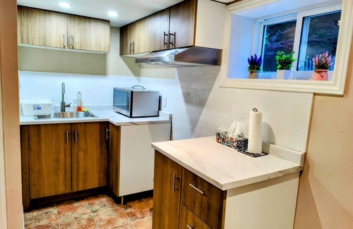 Longueuil House | Family-Friendly Spacious 2BR Cozy Basement suite | Near Attractions | Sleepsn5