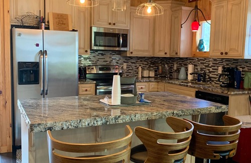 Pettit Cabin | Family friendly. Swim beach below house