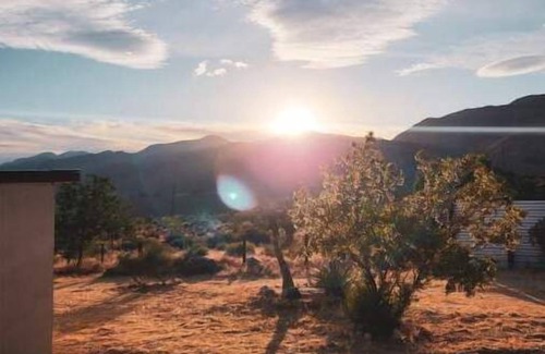 Morongo Valley Cabin | Family friendly desert cabin with mountain views, pool table and indoor chimney.