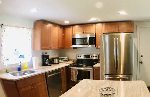 Kenyon House | Family Friendly get away by the coast with the pool to relax at in the evening