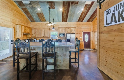 Chico House | Family lake front home with dock, kayak, outdoor kitchen and more