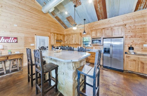 Chico House | Family lake front home with dock, kayak, outdoor kitchen and more