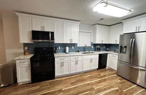 Decatur House | Family Oasis BBQ Patio Bathtub and Spacious Comfort