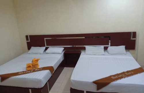 Sidomulyo House | Family Rooms 4 pax at Mutiara Batu