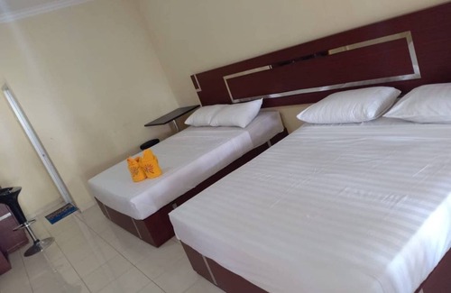 Sidomulyo House | Family Rooms 4 pax at Mutiara Batu