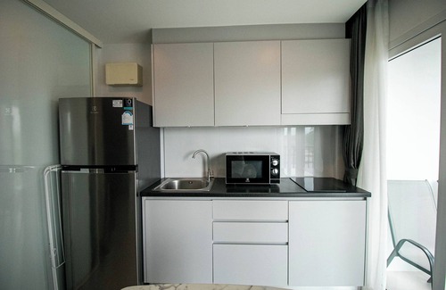 Kram Condo | Family-sized condo with well equiped kitchen, AC, Balcony and near by the beach