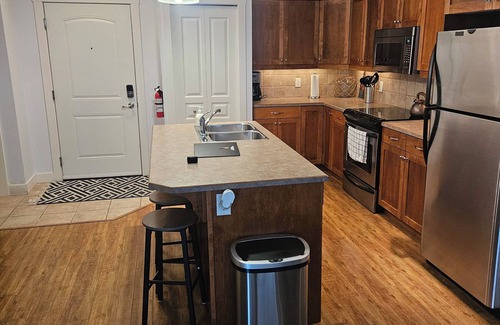 Sicamous Condo | Family-sized condo with boat slip, games room, Gym & deck, pool & hottub.