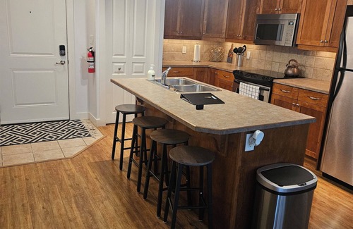 Sicamous Condo | Family-sized condo with boat slip, games room, Gym & deck, pool & hottub.
