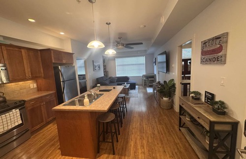 Sicamous Condo | Family-sized condo with boat slip, games room, Gym & deck, pool & hottub.