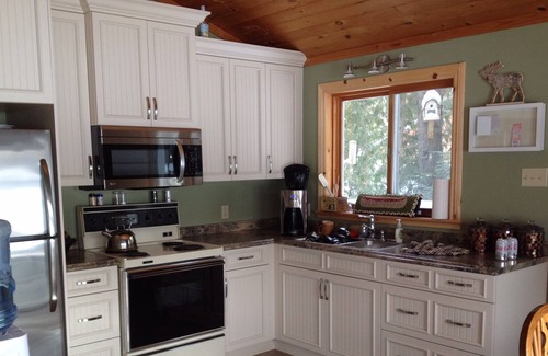 Washago House | Family sized cottage with dock,deck,gazebo,firepit,small sandy beach.