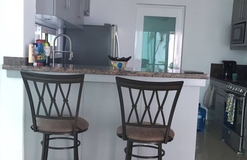 San Miguel House | Family-sized private home walking distance to airport! 2 min (car) to the ocean.
