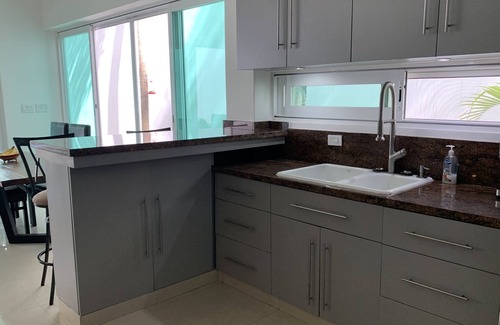 San Miguel House | Family-sized private home walking distance to airport! 2 min (car) to the ocean.