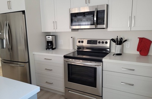 North Rustico House | Family-sized townhouse. Just minutes to the beach, golf courses & much more.