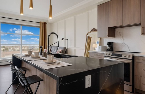 Currie Barracks Condo | Family Stylish 2BR Condo w/City View, DT, Balcony, F/Parking & In-Suite Laundry!