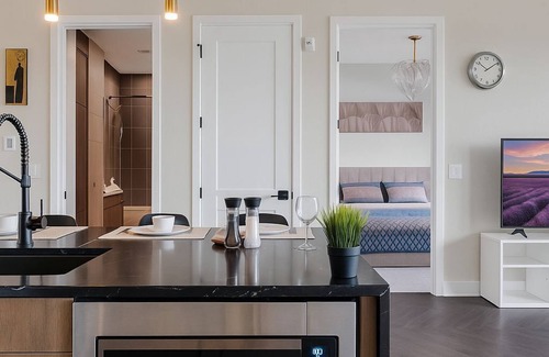 Currie Barracks Condo | Family Stylish 2BR Condo w/City View, DT, Balcony, F/Parking & In-Suite Laundry!