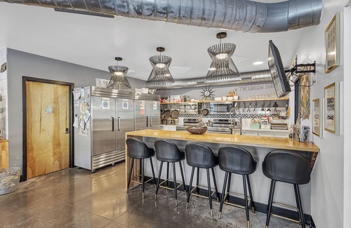 Pacific Hotel | Family suite with private kitchenette in boutique hotel with onsite activities