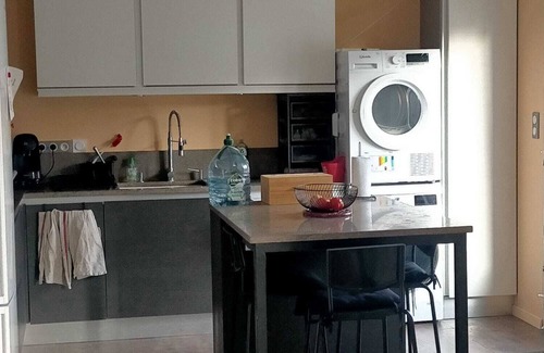 Quartier du Stade House | Family townhouse with garden close to shops and beach.