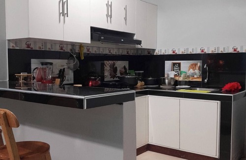 Sauce House | Family vacation home with a view of the forest and access to a small river.
