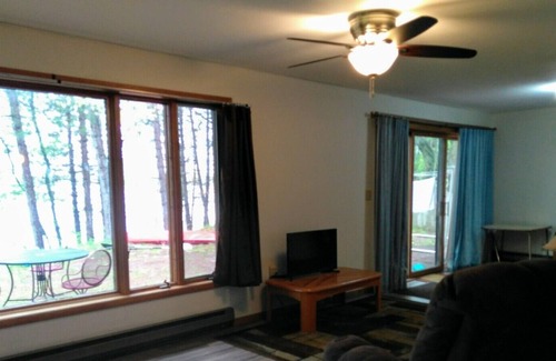 Jim Falls House | Family vacation lake home with a beach, dock, and boats on Fireside Lake.