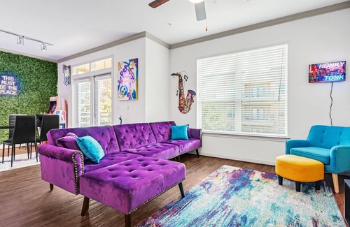 South Main Apartment | Fancy Purple Las Vegas Hotel Theme w/Arcade Games