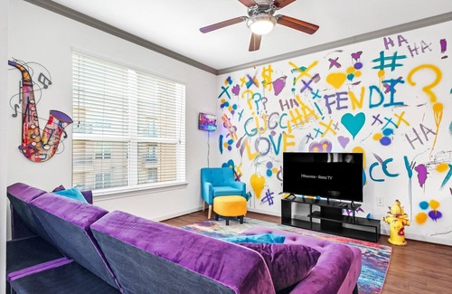 South Main Apartment | Fancy Purple Las Vegas Hotel Theme w/Arcade Games