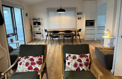Omaha House | Fantastic Estuary & Golf Course Views, Huge Deck, Great Sunsets, Modern & Cosy