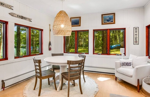 Lac du Flambeau House | Fantastic lakefront escape with dock, boat slip, fast WiFi, firepit, & gas grill