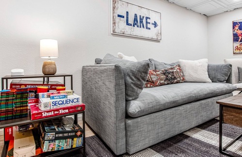 Lac du Flambeau House | Fantastic lakefront escape with dock, boat slip, fast WiFi, firepit, & gas grill