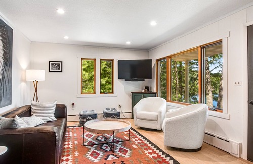 Lac du Flambeau House | Fantastic lakefront escape with dock, boat slip, fast WiFi, firepit, & gas grill