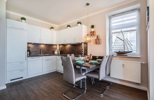 Gohren Apartment | Fantastic sea view from the balcony, use of swimming pool and sauna - Villa Bergfrieden