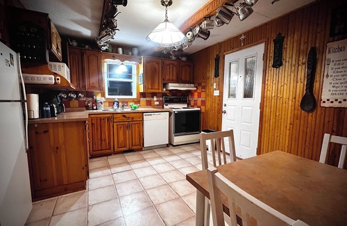 Pontiac Ski Chalet | Fantastic view cosy retreat by the river with forests and swamps to explore.