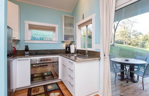 Front Royal Cabin | Fantasy Getaway Cottage on Private Pond with Waterfall, Rock Pool and Hot Tub