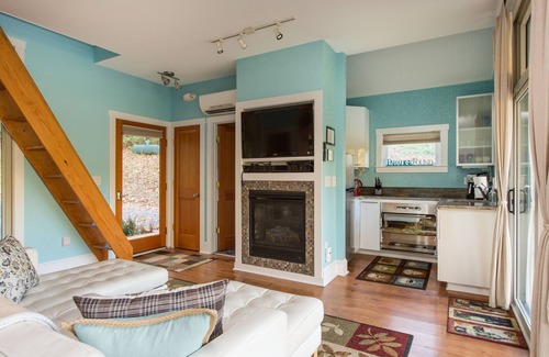 Front Royal Cabin | Fantasy Getaway Cottage on Private Pond with Waterfall, Rock Pool and Hot Tub