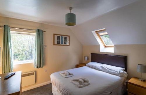Farley House | Farley, woodland lodge with hot tub for 8