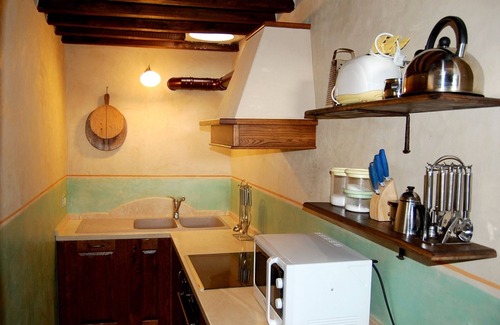 Siena Historical Center Apartment | FARMH. PODERE CUNINA 25 KM SUD SIENA DI FRONTE AL MONTALCINO PRENDENDO LEZIONI DI CUCINA