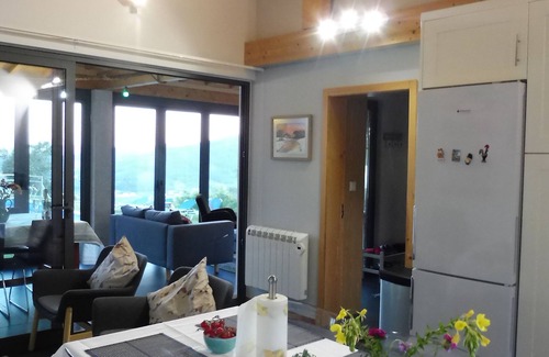 Portela House | Farmhouse accommodation for 10 people, with private pool, BBQ, garden and Wifi .