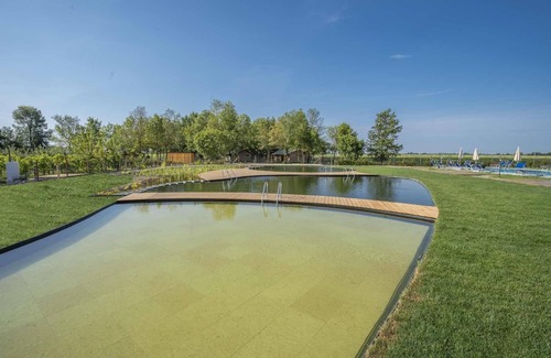 Palazzolo dello Stella Apartment | Fattoria 1, spacious apartment in the farm courtyard