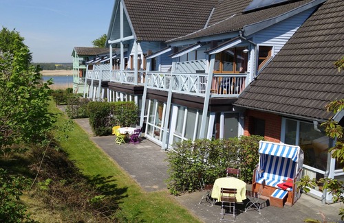 Neuensien Apartment | Feel-good living at the lake, 2-4 people, terrace, heated winter garden