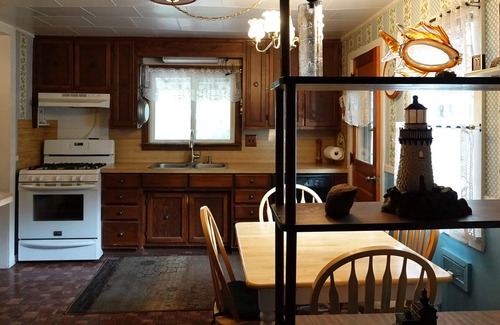 Tawas City House | Feel of an "Up North" cottage with the convenience of in-town East Tawas