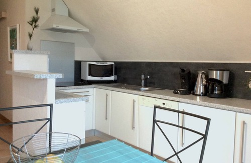 Tregastel Apartment | Feet in the water for this comfortable apartment facing the sea s/GR 34 Tregastel