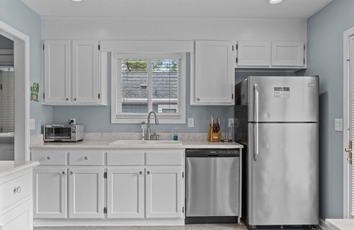 Tranquil Harbour House | Fenced in yard, Short walk to the beach from this spacious home. Dogs welcome!