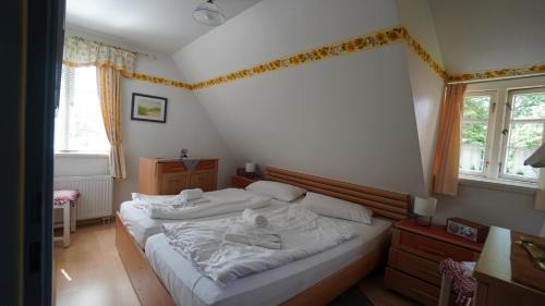 Oevenum Apartment | Ferien unterm Reetdach Whg 01