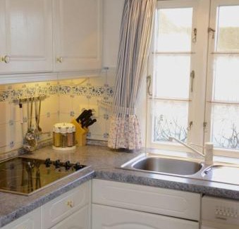 Oevenum Apartment | Ferien unterm Reetdach Whg 02