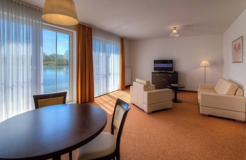 Perleberg Resort | Ferienappartement am See im Hotelresort Neuer Hennings Hof